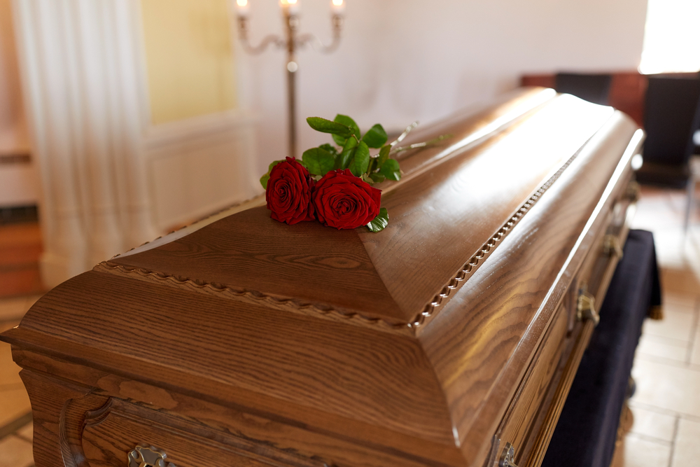 coffin with roses on it wrongful death