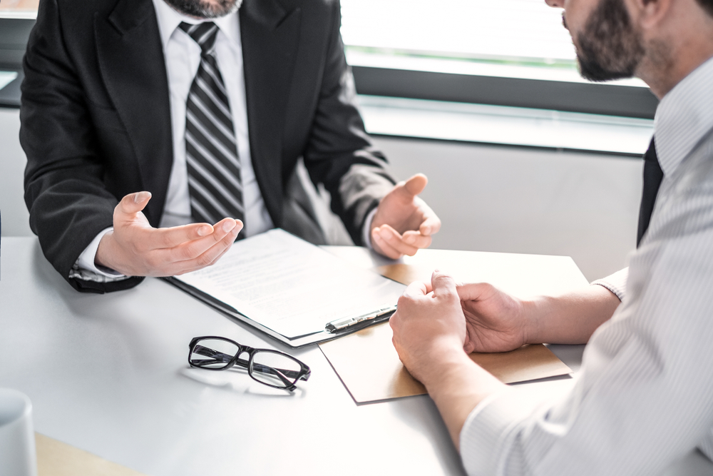 lawyer talking with client