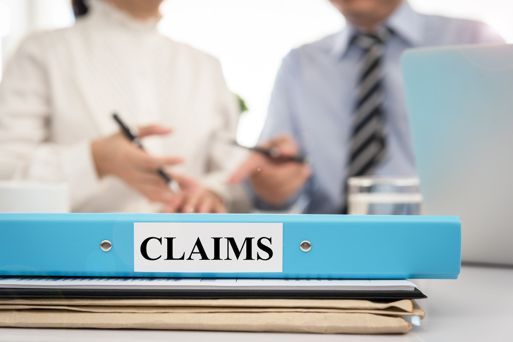 people negotiating on a bad faith insurance claim